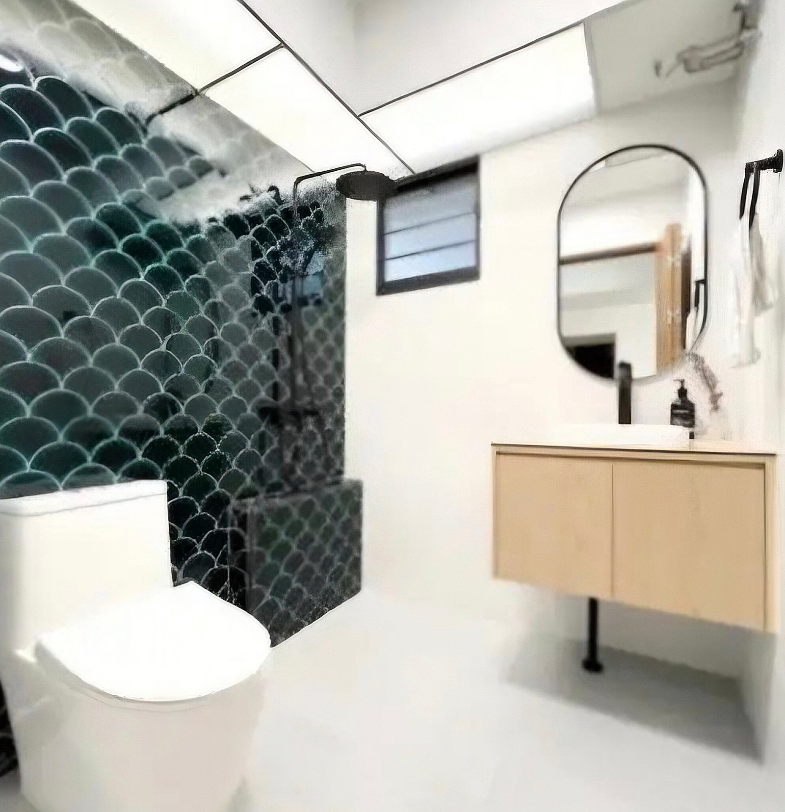 After — Kamar mandi · aksen hijau Kemang Village